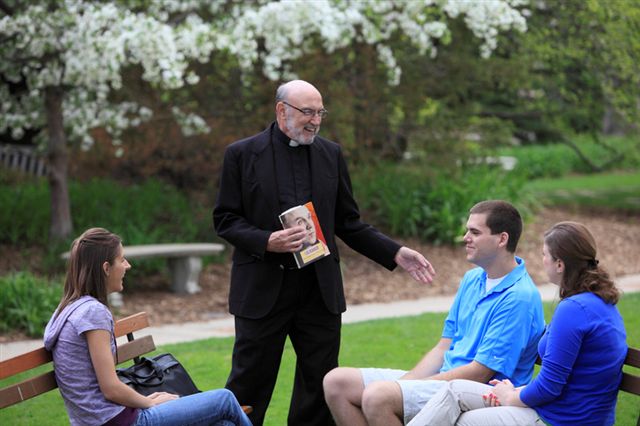 Fr_Hauser_and_students